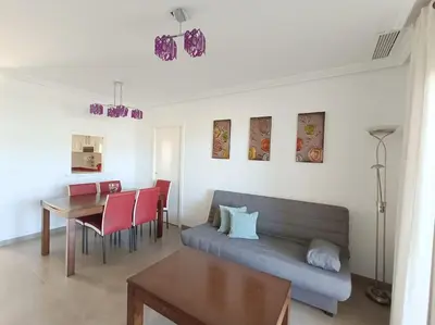 Zona de estar de Mar y Sal 12 Suites, gran terraza con vistas al mar, 2 Hab, garaje y piscina