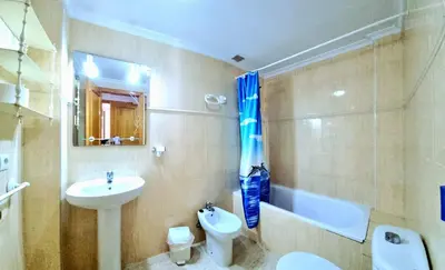 Un baño de Apartamento bajo VERAMAR 1 frente a piscina 2 dormitorios
