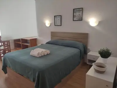 Cama o camas de una habitación en Roquetas Costa