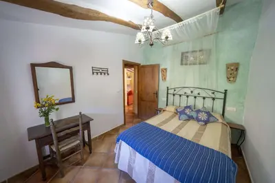 Cama o camas de una habitación en farmhouse San Marcos