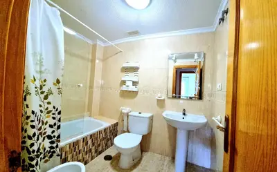 Un baño de Apartamento en planta baja Veramar 5 primera línea de playa