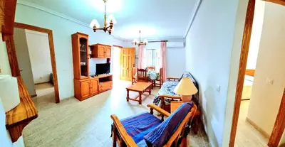 Una televisión o centro de entretenimiento en Apartamento en planta baja Veramar 5 primera línea de playa