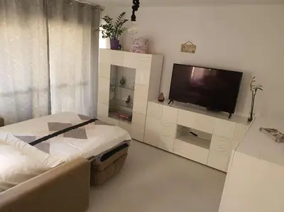 Cama o camas de una habitación en Ático en la playa