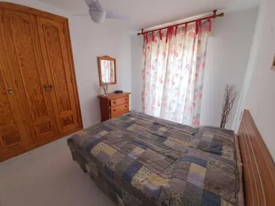 Cama o camas de una habitación en Ático en la playa