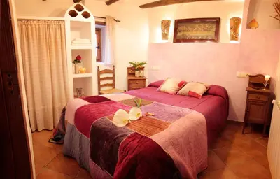 Cama o camas de una habitación en Romantic house for 2 or 4 people with jacuzzi