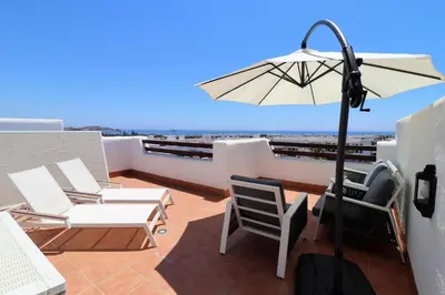 Un balcón o terraza de Casa Flamenco, ático de lujo.