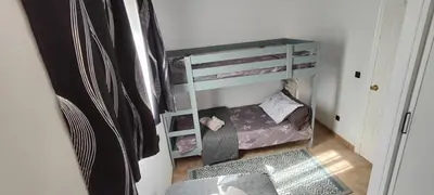 Cama o camas de una habitación en BeachHouseVeraPlaya