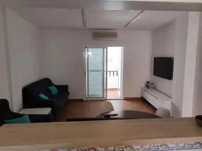 Una televisión o centro de entretenimiento en Apartamento La Amatista
