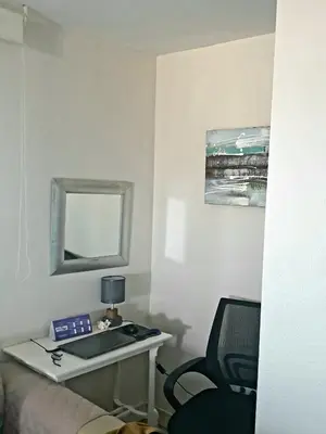 Una televisión o centro de entretenimiento en Appartement Super Terrasse Vue Panoramique Mer