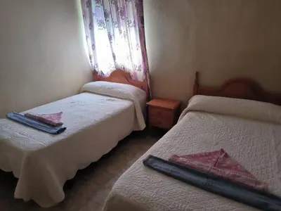 Cama o camas de una habitación en Plaza San Jose, AA, a pie de mar, wifi