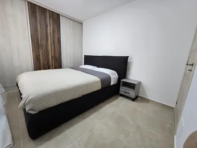Cama o camas de una habitación en Edificio tarragona