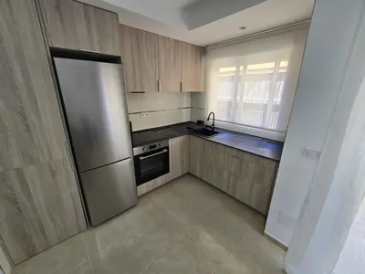 Una cocina o zona de cocina en Edificio tarragona