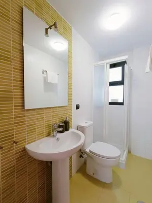 Un baño de Toyo Alcazaba Suites Gran terraza y vistas, 2Hab, piscina y garaje