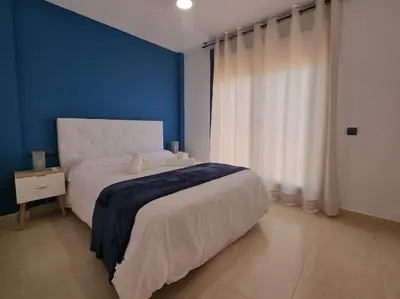 Cama o camas de una habitación en Toyo Alcazaba Suites Gran terraza y vistas, 2Hab, piscina y garaje