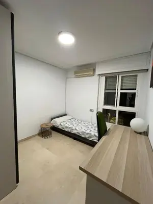Cama o camas de una habitación en Mediterráneo Playa, a 3min del mar y con aire acondicionado