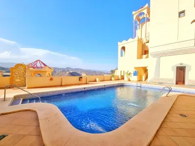 Piscina en o cerca de Apartamento con piscina, urbanización privada by AlohaPalma