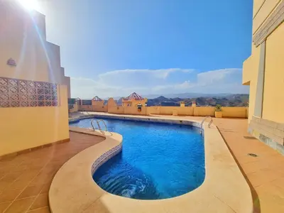 Piscina en o cerca de Apartamento con piscina, urbanización privada by AlohaPalma