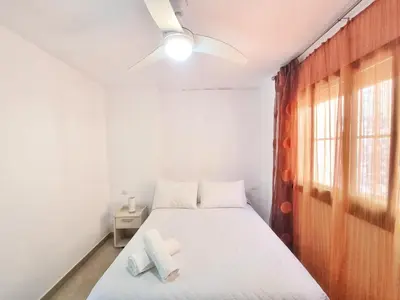 Cama o camas de una habitación en Apartamento con piscina, urbanización privada by AlohaPalma