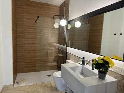 Un baño de CASA YANGUAS APARTAMENTOS RURALES EN LAUJAR DE ANDARAx
