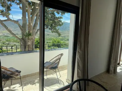 Un balcón o terraza de CASA YANGUAS APARTAMENTOS RURALES EN LAUJAR DE ANDARAx