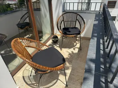 Un balcón o terraza de CASA YANGUAS APARTAMENTOS RURALES EN LAUJAR DE ANDARAx