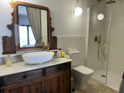 Un baño de CASA YANGUAS APARTAMENTOS RURALES EN LAUJAR DE ANDARAx