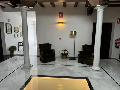 Zona de estar de CASA YANGUAS APARTAMENTOS RURALES EN LAUJAR DE ANDARAx