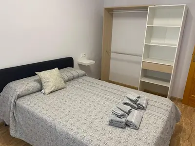 Cama o camas de una habitación en BALERMAPLAYA calle lago