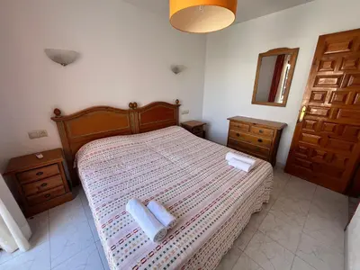 Cama o camas de una habitación en Vera Playa Vera Beach