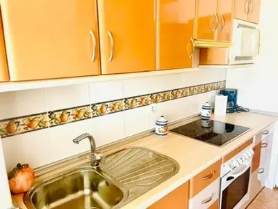 Una cocina o zona de cocina en Castillo Suites, Vivienda con Fines Turísticos El Castillo de Roquetas