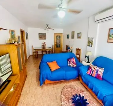 Una televisión o centro de entretenimiento en Castillo Suites, Vivienda con Fines Turísticos El Castillo de Roquetas
