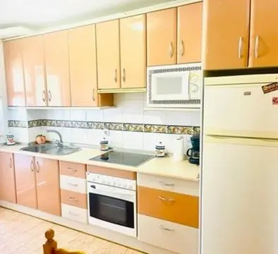 Una cocina o zona de cocina en Castillo Suites, Vivienda con Fines Turísticos El Castillo de Roquetas