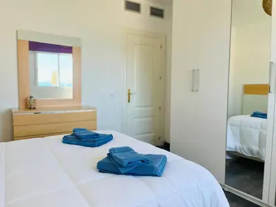 Cama o camas de una habitación en Apartamento Romanilla Roquetas
