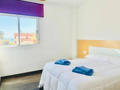 Cama o camas de una habitación en Apartamento Romanilla Roquetas