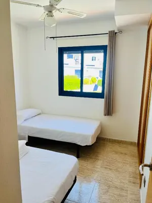 Cama o camas de una habitación en Apartamento Perla Playa