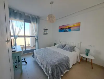 Cama o camas de una habitación en Apartamento cerca de la playa - El amanecer de Vera