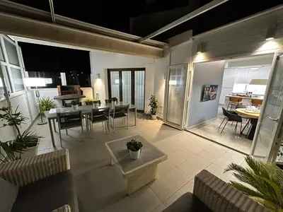 Zona de estar de The Penthouse