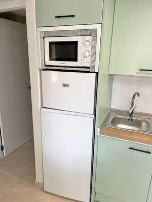 Una cocina o zona de cocina en Ático PalamiRey - 2 terrazas, WIFI, barbacoa, zona especial niños