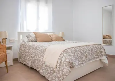 Cama o camas de una habitación en MojacarProperty, Casa Luisa 1ª Línea de Playa