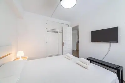 Cama o camas de una habitación en TrendyHomes Gaviotas, playa a un par de minutos andando y aire acondicionado