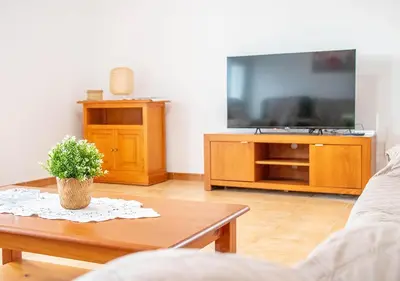 Una televisión o centro de entretenimiento en MojacarProperty, Casa Ginés 1ª Línea de Playa