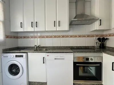 Una cocina o zona de cocina en El Faro Puerto Rey - Vera Playa