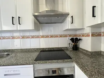 Una cocina o zona de cocina en El Faro Puerto Rey - Vera Playa