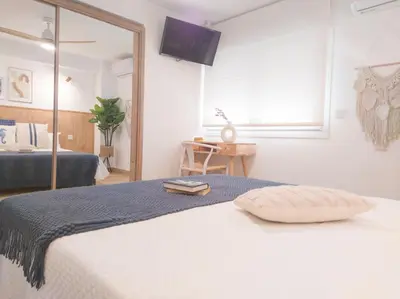 Cama o camas de una habitación en Hogar Digital Playa y Piscina en Urbanización Roquetas de Mar
