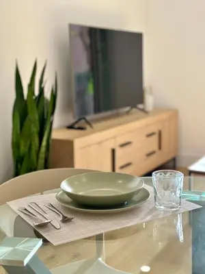 Una televisión o centro de entretenimiento en Apartamento céntrico en almeria
