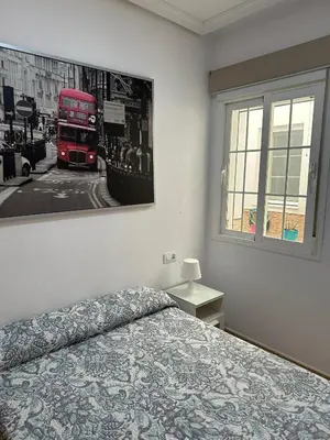 Cama o camas de una habitación en Casa Ciudad Jardín