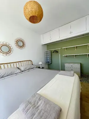 Cama o camas de una habitación en Apartamento Indalo en primera linea de playa
