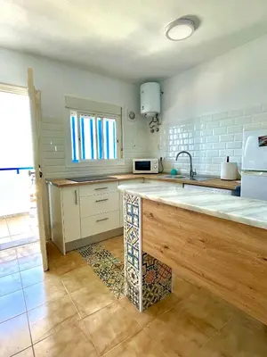 Una cocina o zona de cocina en Apartamento Indalo en primera linea de playa