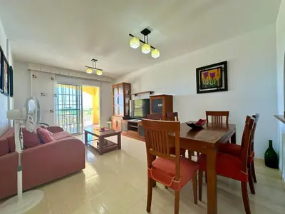 Una televisión o centro de entretenimiento en Casa Dream Beach