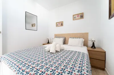 Cama o camas de una habitación en CT 288 AL - Faro's Retamar Cuddly Nest for 2
